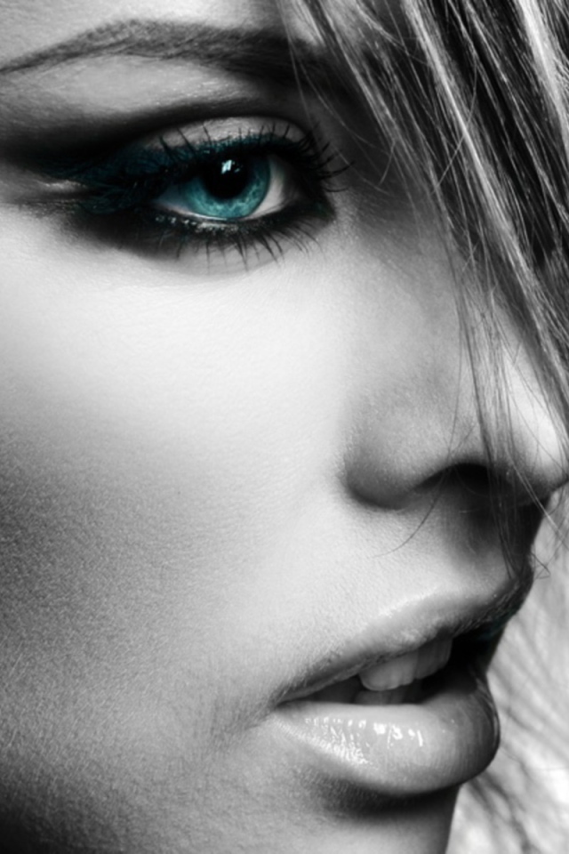 	 Black and white portrait with blue eyes