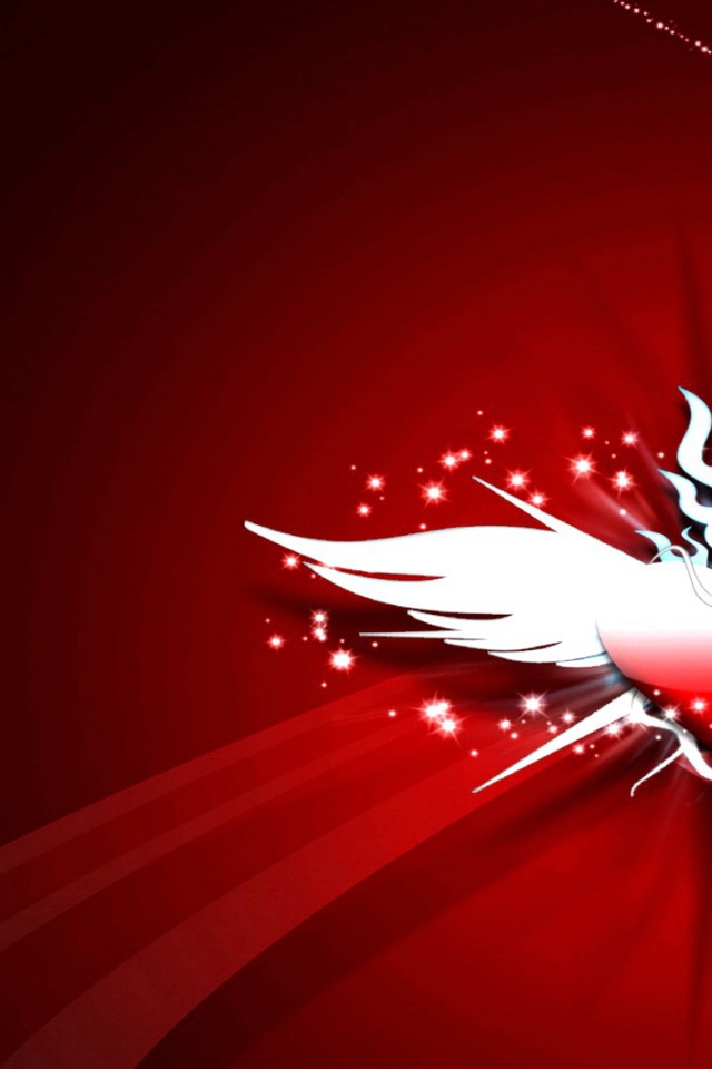 Сердечко с крыльями на красном фоне