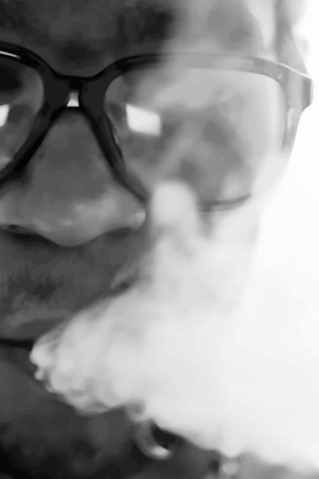 Kid Cudi blowing smoke