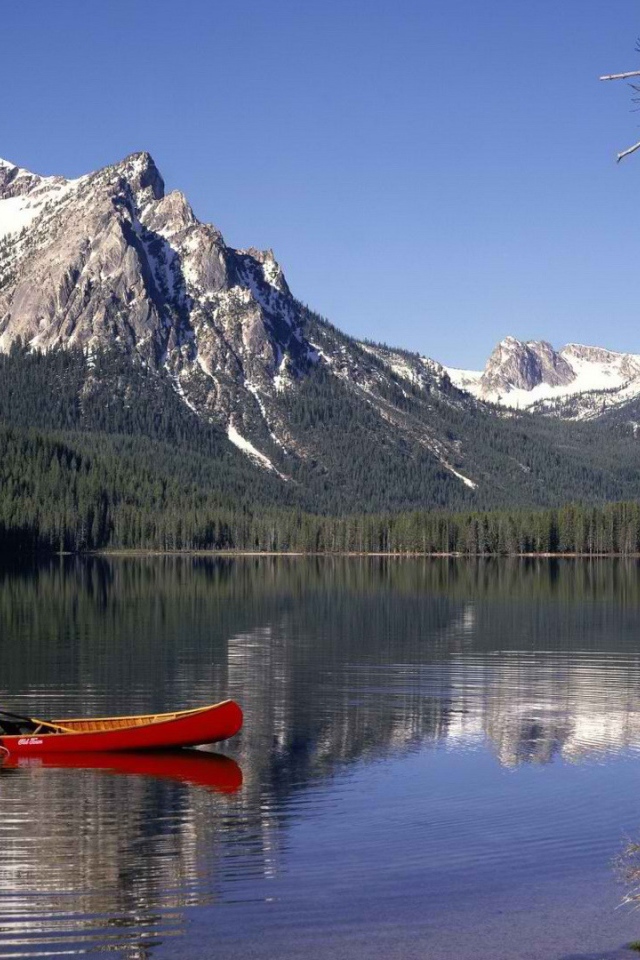 Рыбак на каное