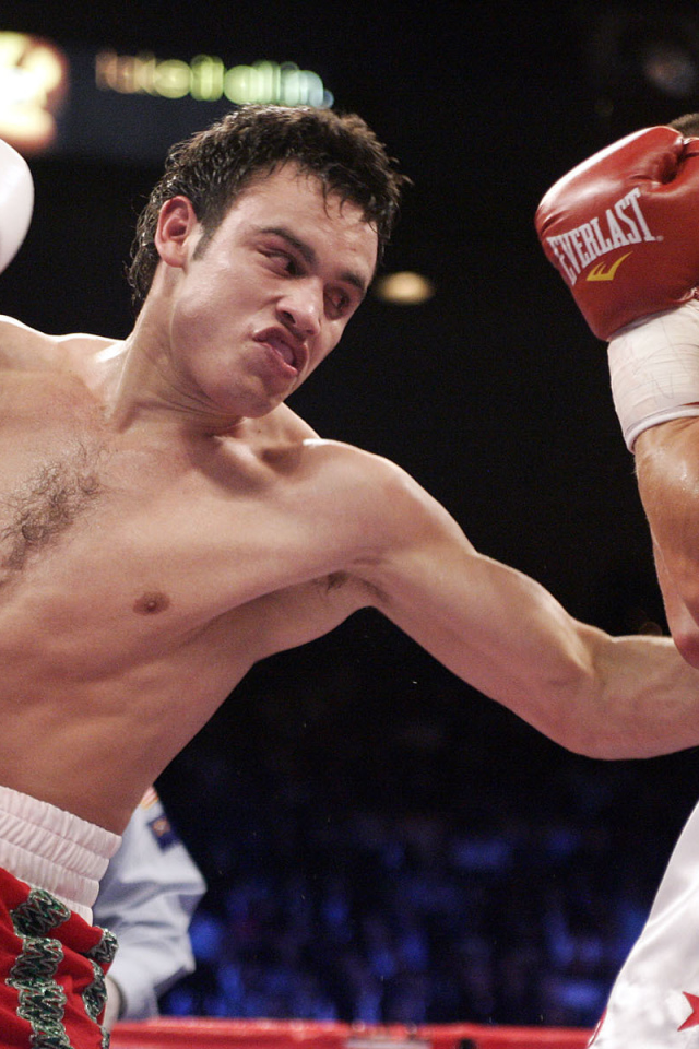 Боксер Оскар Дела Хойя