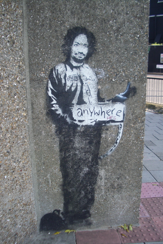 Граффити с заключённым, художник Бэнкси