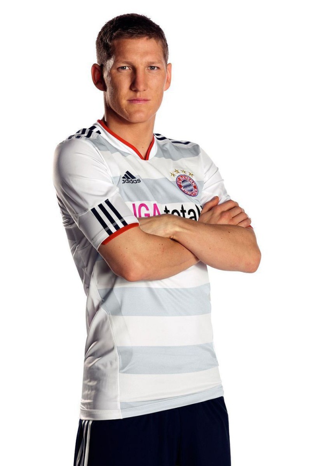 The football player of Bayern Bastian Schweinsteiger on white background