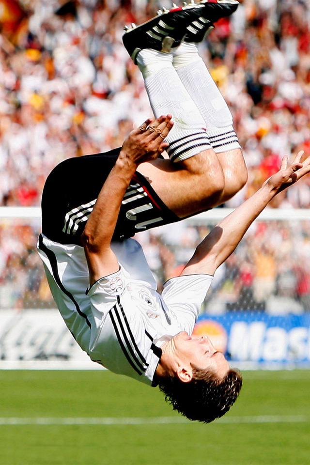 The football player of Lazio Miroslav Klose does a flip