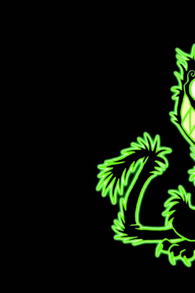 Зеленый кот на черном фоне