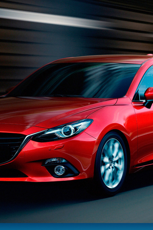 Красивый автомобиль Mazda 3 2014