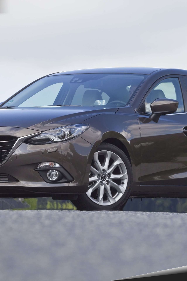 Дизайн автомобиля Mazda 3 2014