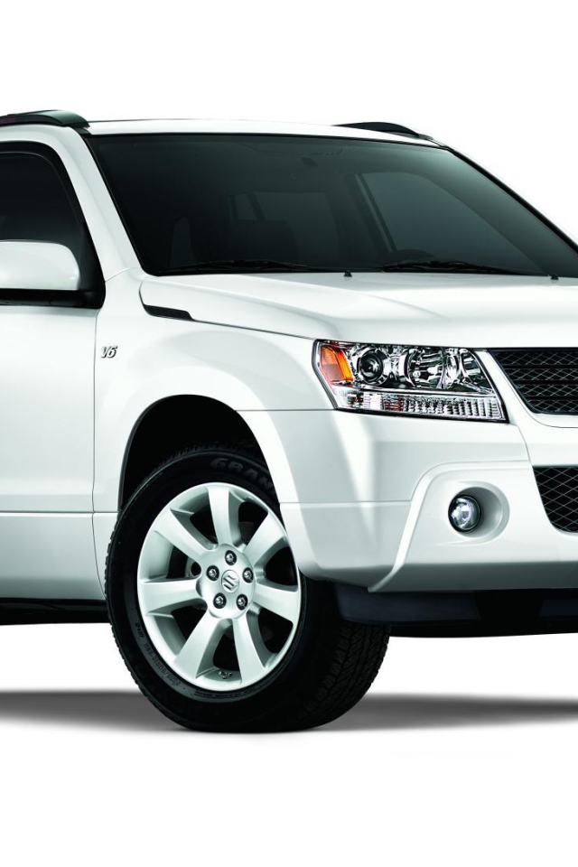  Красивый автомобиль Suzuki Grand Vitara 2014