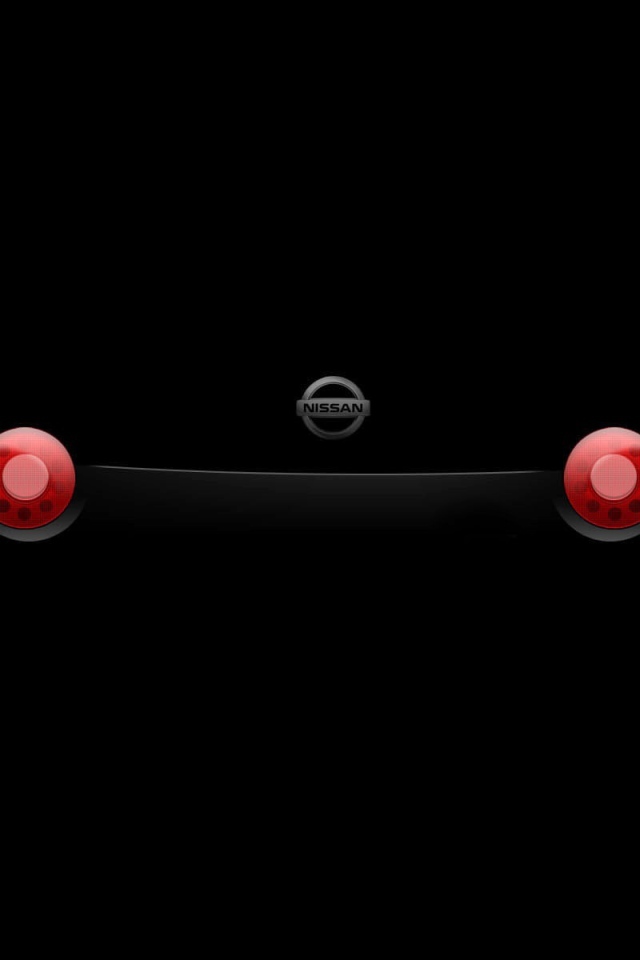 Стоп сигналы автомобиля на черных обоях