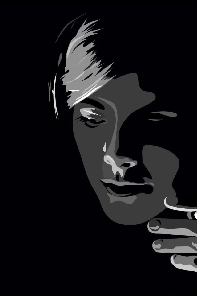 Лицо человека на черных обоях