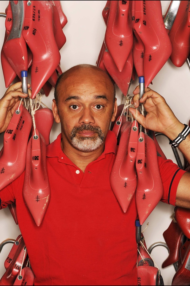 Известный модельер Christian Louboutin