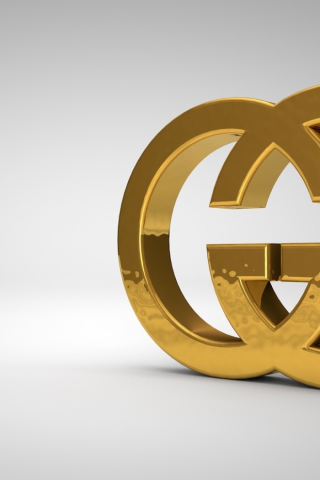 Золотой символ Gucci