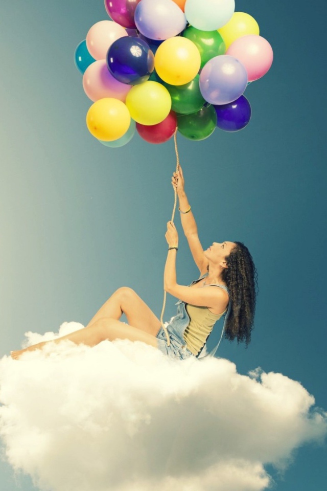 Девушка с шарами на облаке