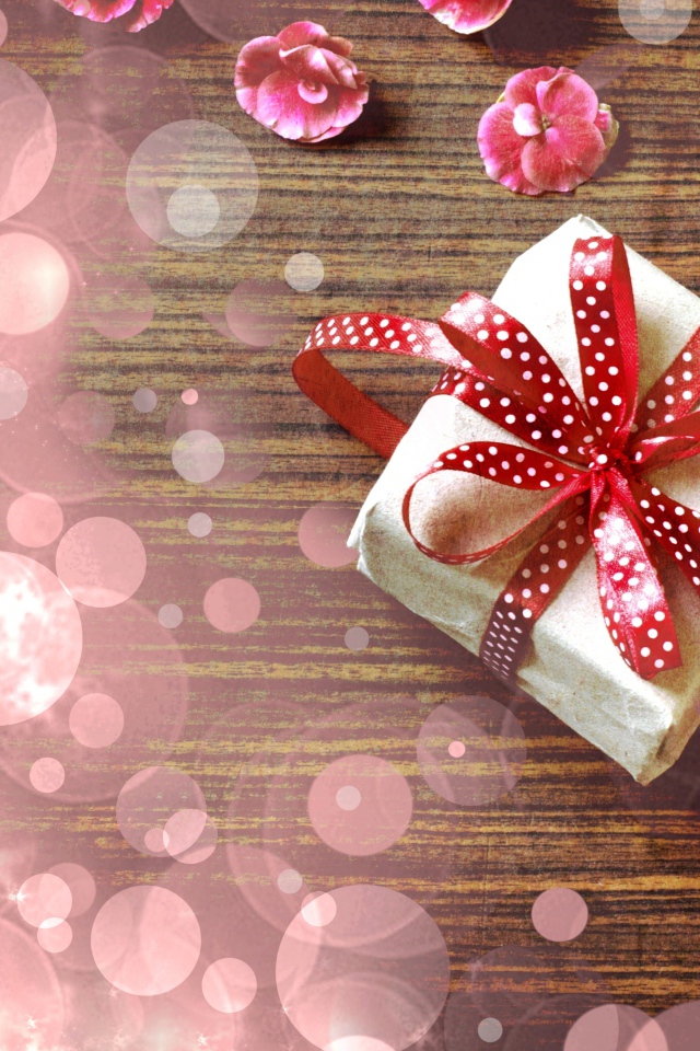 Обвязанный лентой подарок