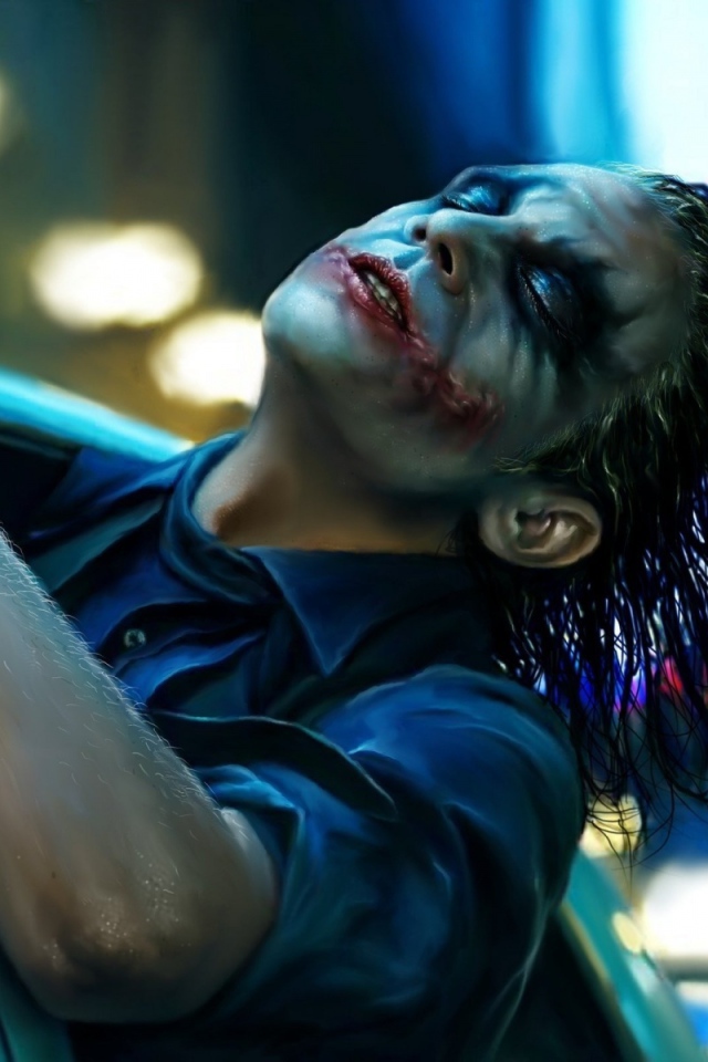 Джокер в полицейском автомобиле