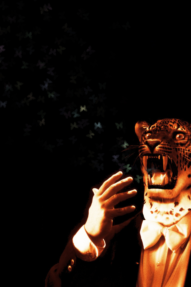 Человек с головой леопарда