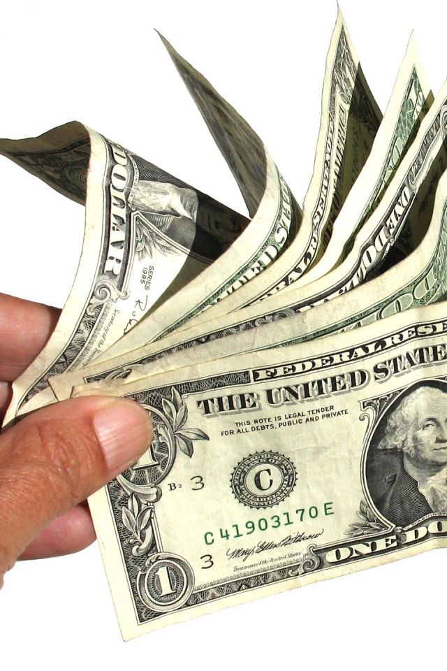 Доллары в руке
