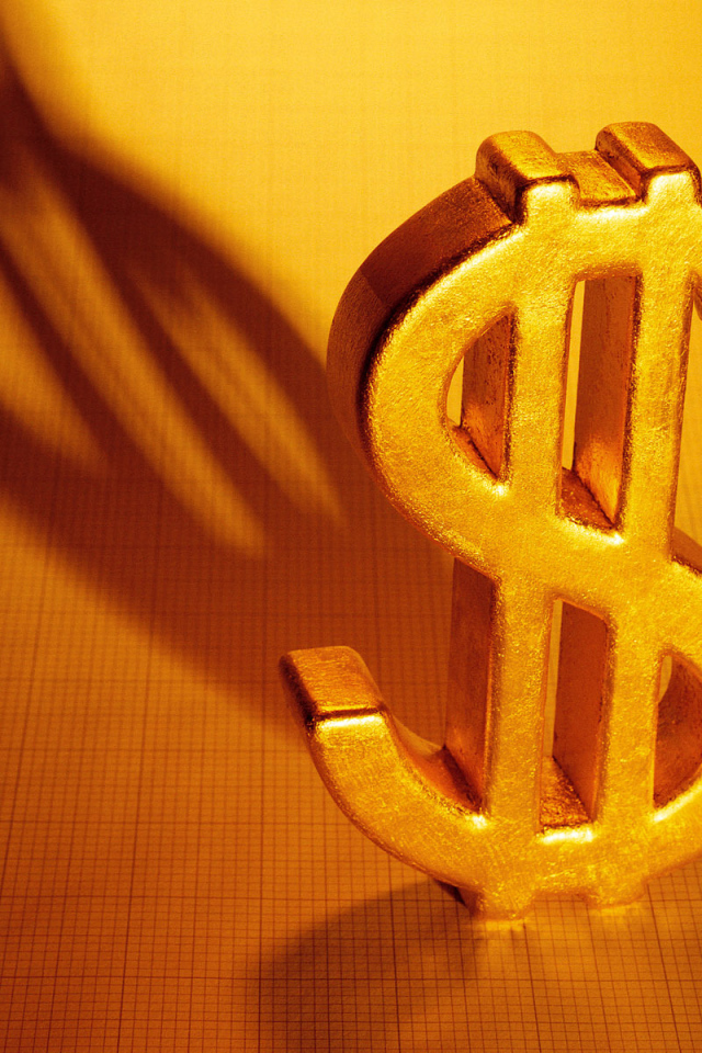 Золотой знак доллара