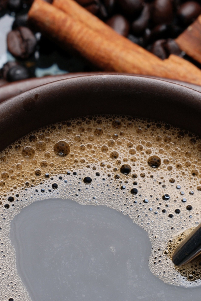 Чашка кофе с корицей