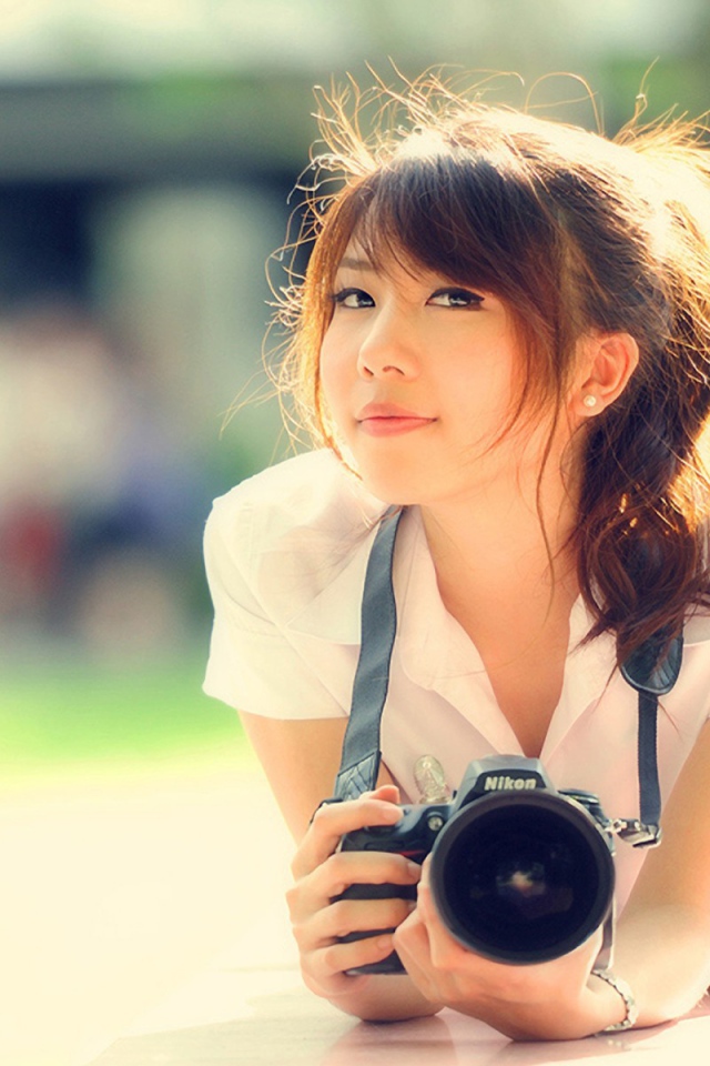 Девушка с фотоаппаратом