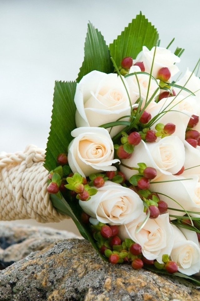 White roses in a wedding bouquet