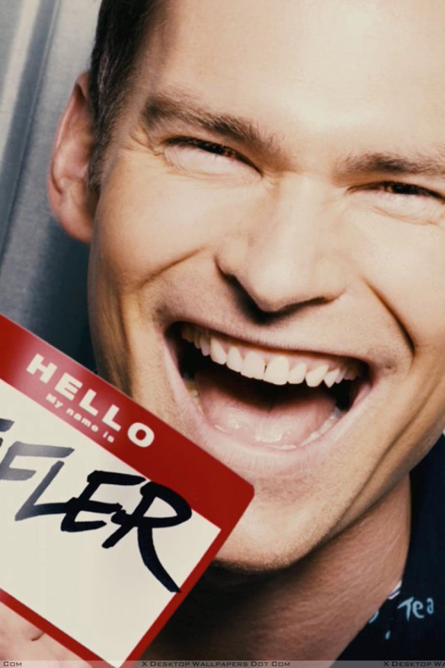 Шонн Уильям Скотт улыбается