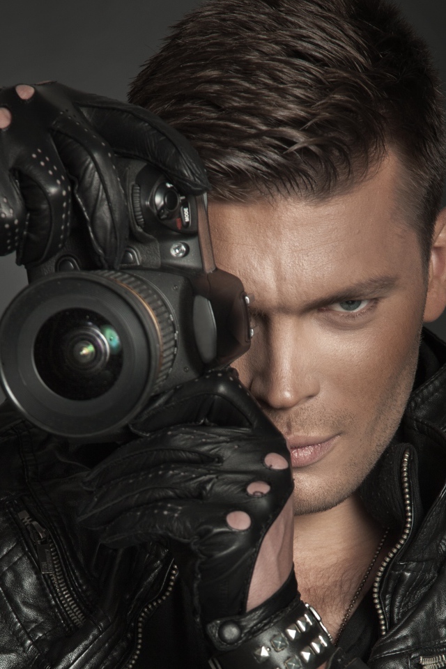 Парень с фотокамерой