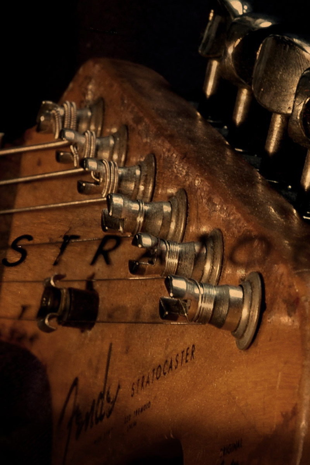 Гриф гитары со струнами