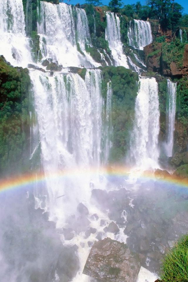 	   Rainbow under a waterfall