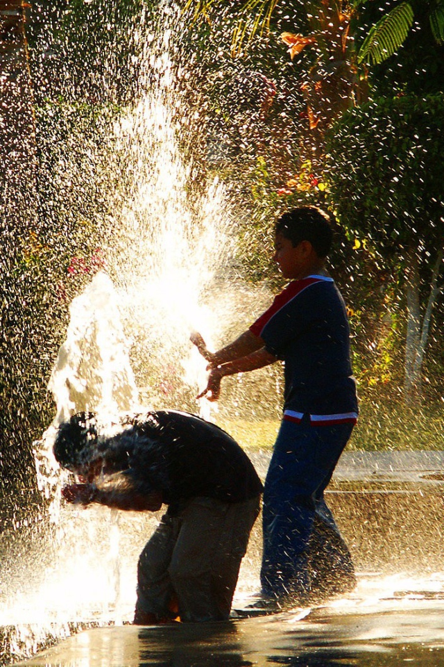 Children poured water