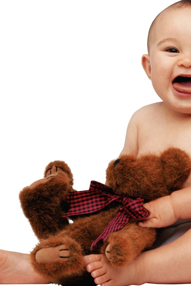 Cute baby with teddy