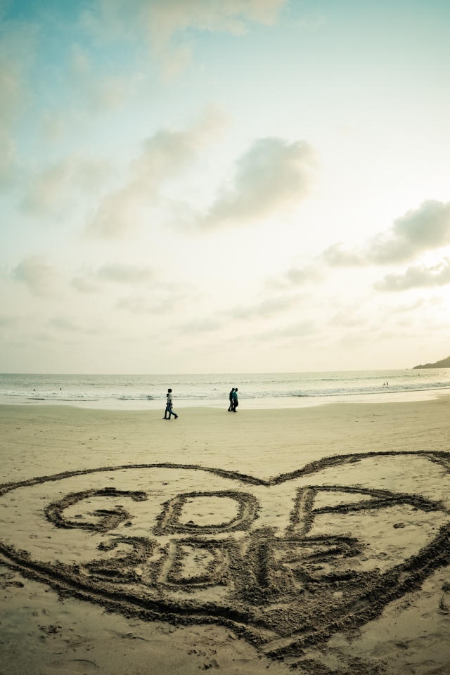 Drawing on the sand in Goa
