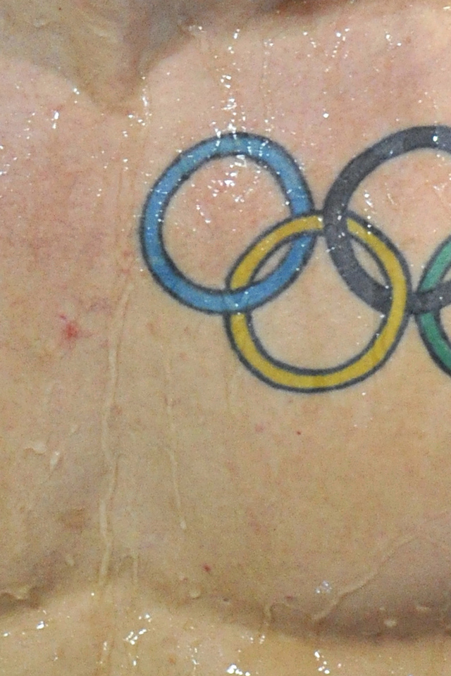 Олимпийские кольца татуировка