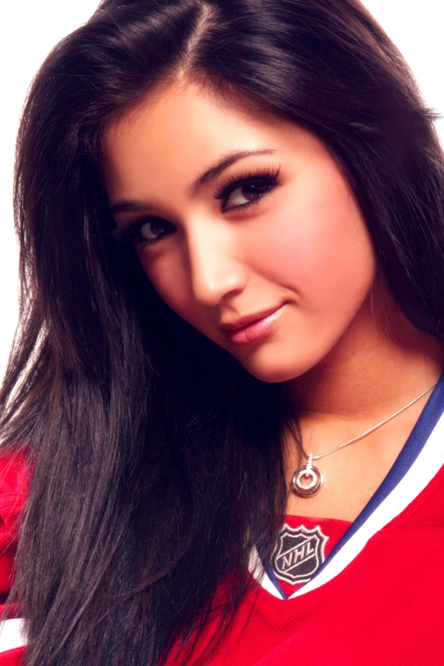 Женщина хоккеист