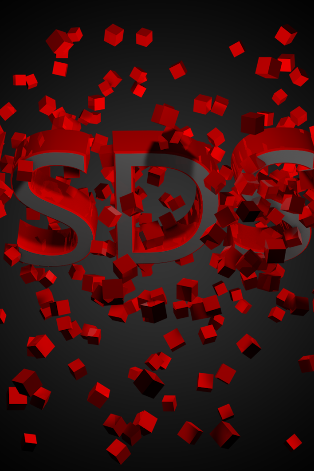 Буквы из красных кубов на черном фоне