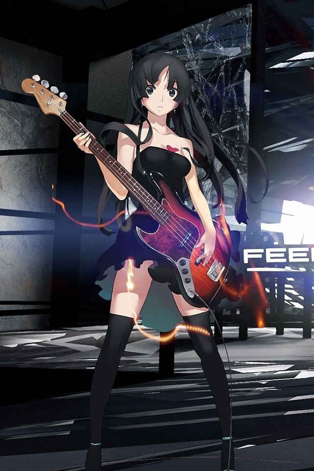 Девушка аниме Akiyama Mio с гитарой