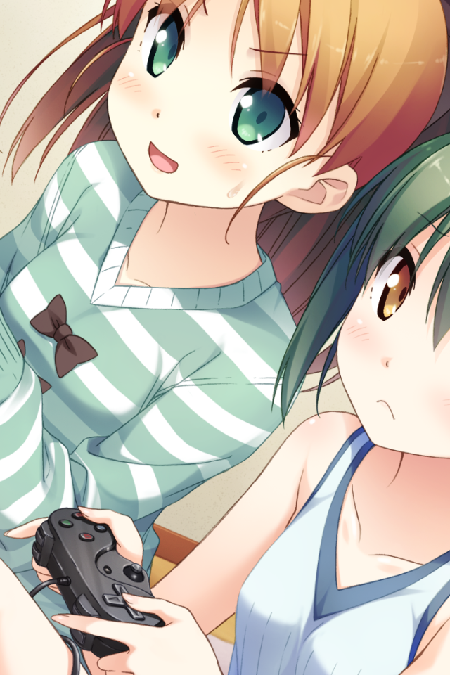 Две девочки аниме играют в видео игры