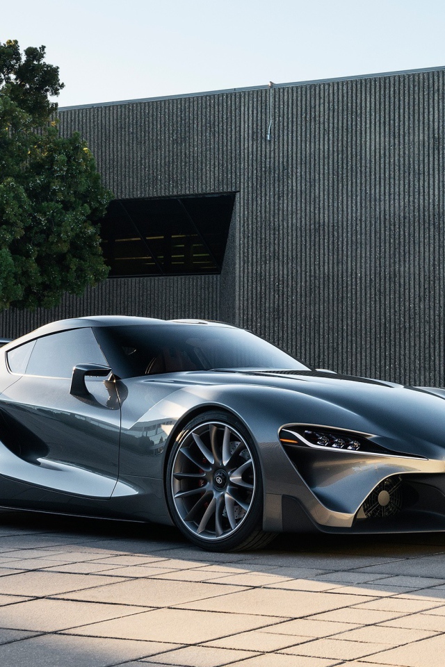 Автомобиль Scion на фоне здания