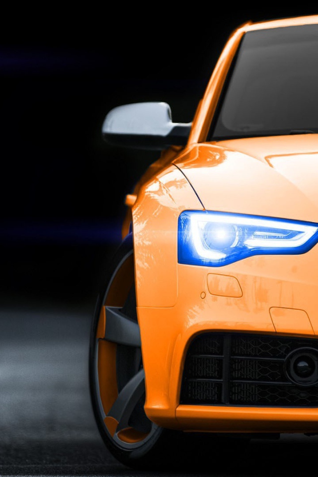 Front of orange Audi Pc5
