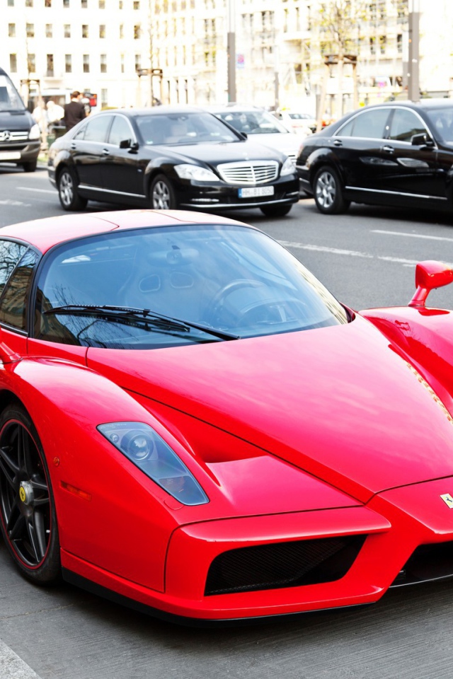 Red Ferrari Enzo on a city street