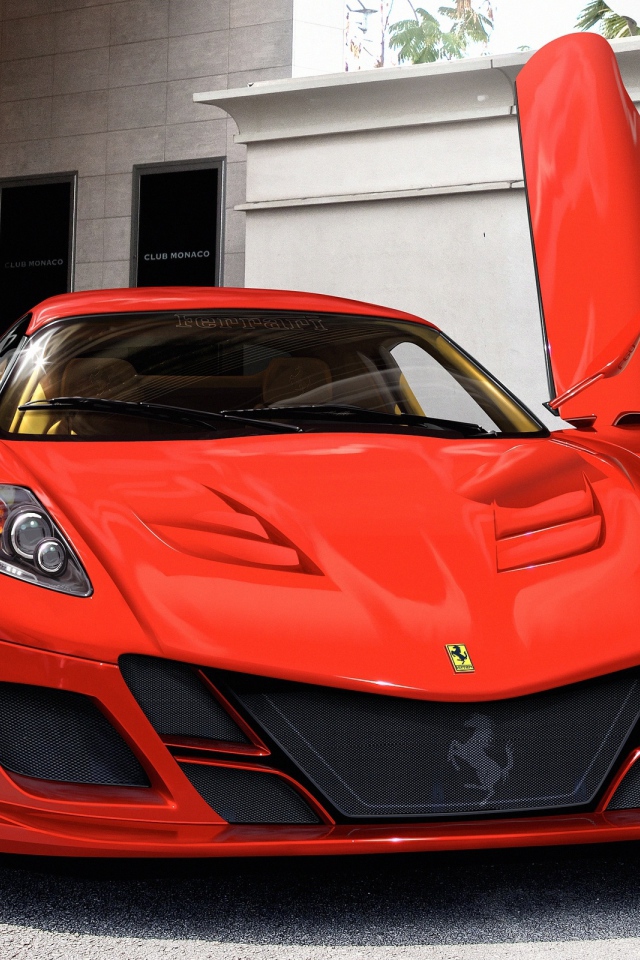 Красный Ferrari у белого здания