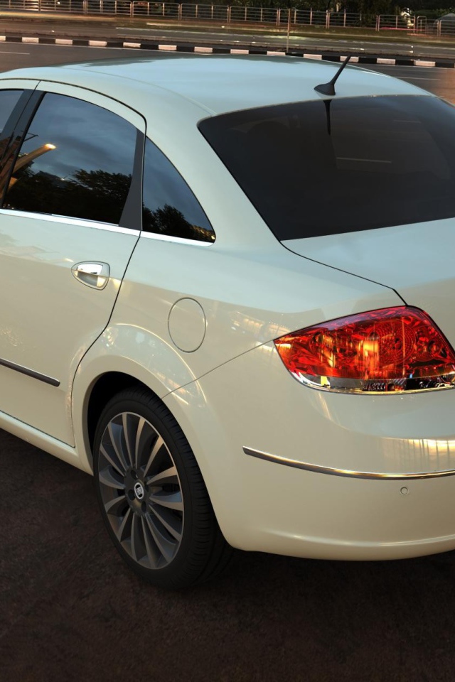 Вид сзади на белый Фиат у дороги