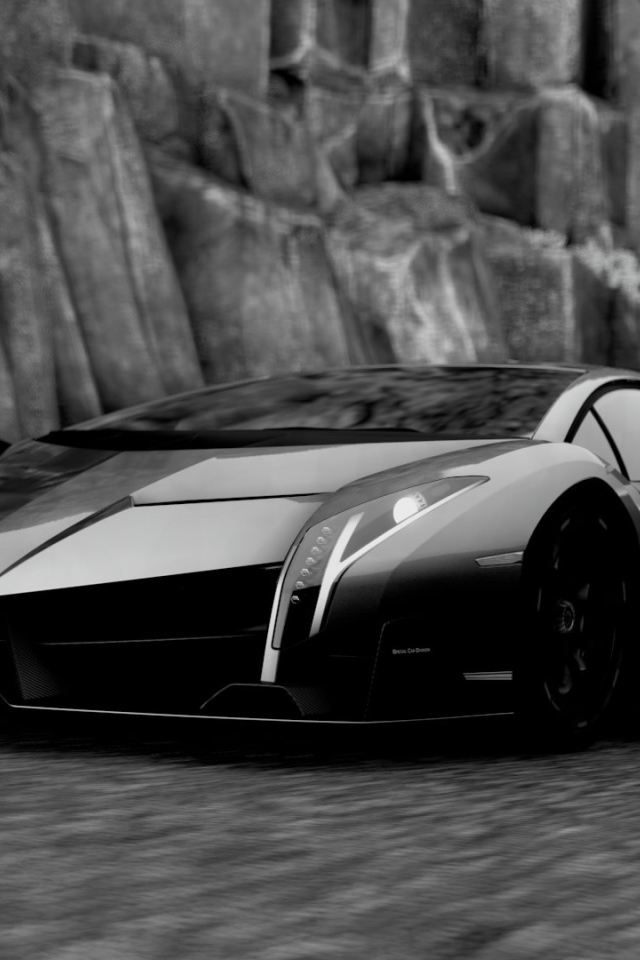 Черный Ламборгини у каменной скалы