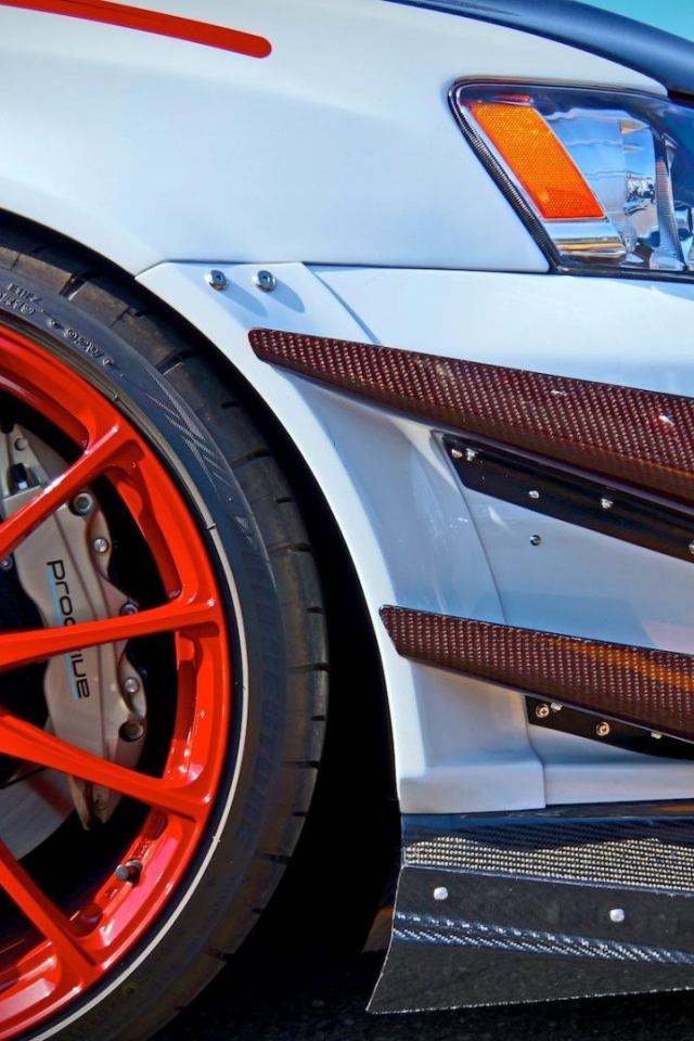 Оранжевый диск автомобиля Mitsubishi Lancer Evo X