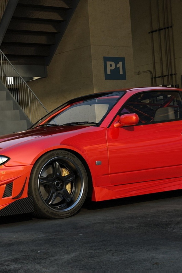 Красный Nissan Silvia S15 у гаража