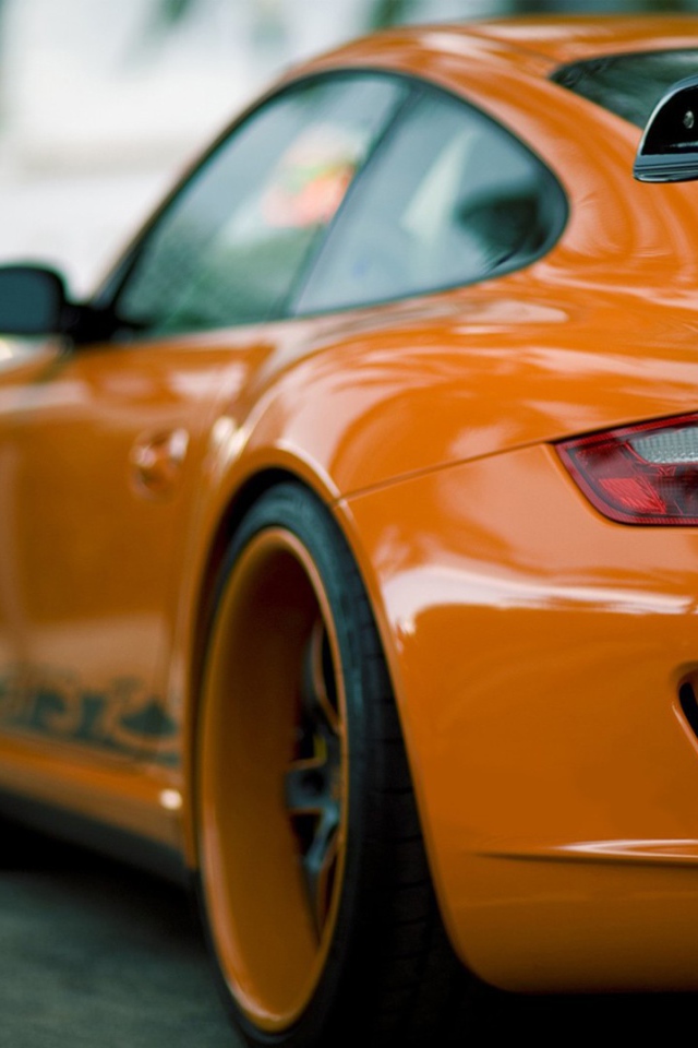 Оранжевый Порш, вид сзади