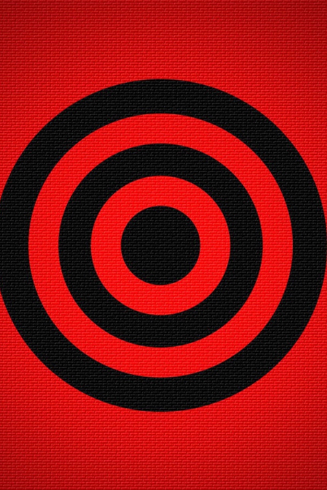 Черная мишень на красном фоне