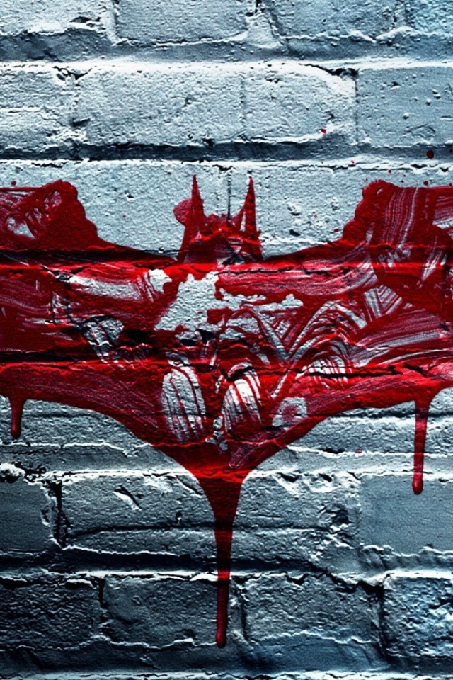 Кровавая летучая мышь на стене