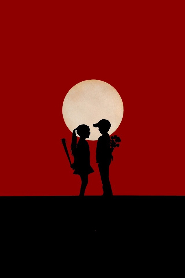 Мальчик и девочка на красном фоне