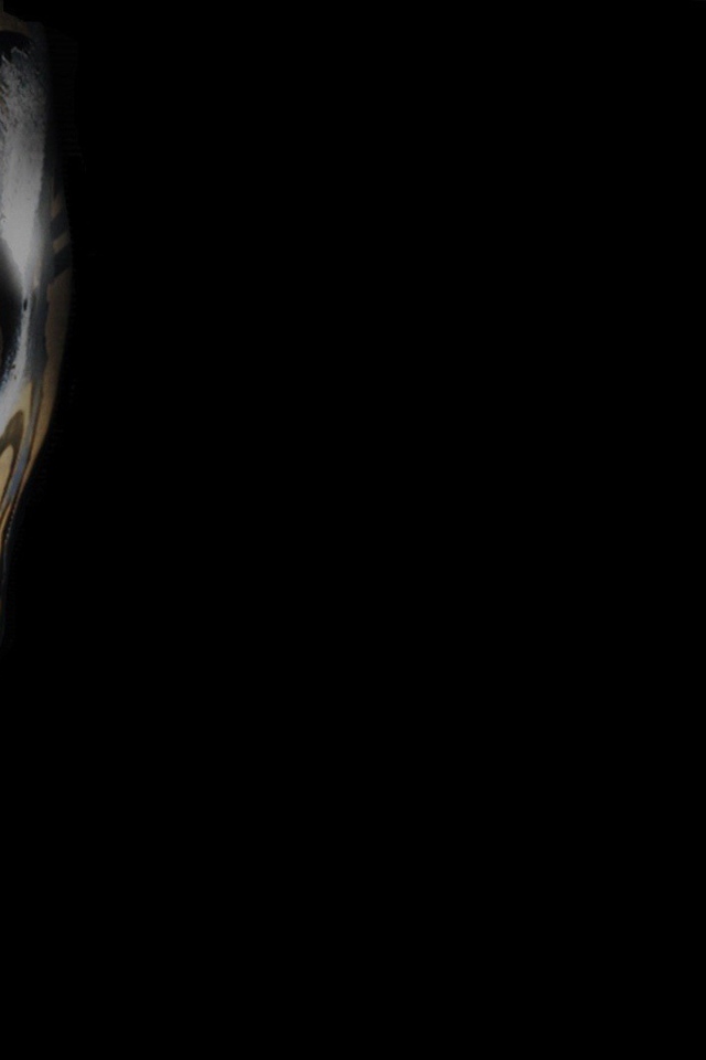 Коричневая маска, черный фон